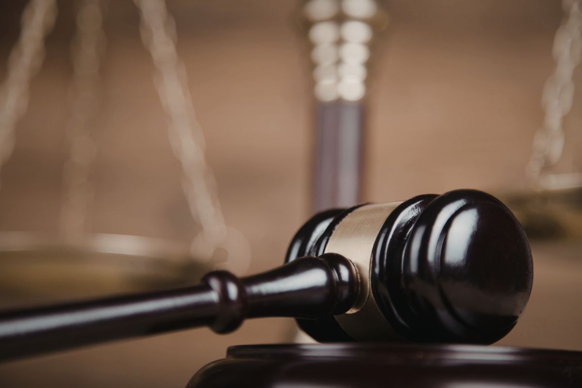 Gavel and scales of justice symbolizing law and order. Gavel and scales of justice symbolizing law and order.