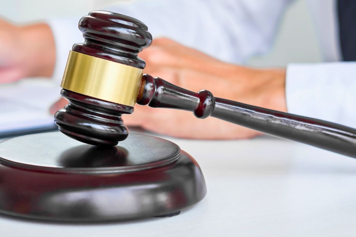 Judge’s gavel on a desk. Judge’s gavel on a desk.