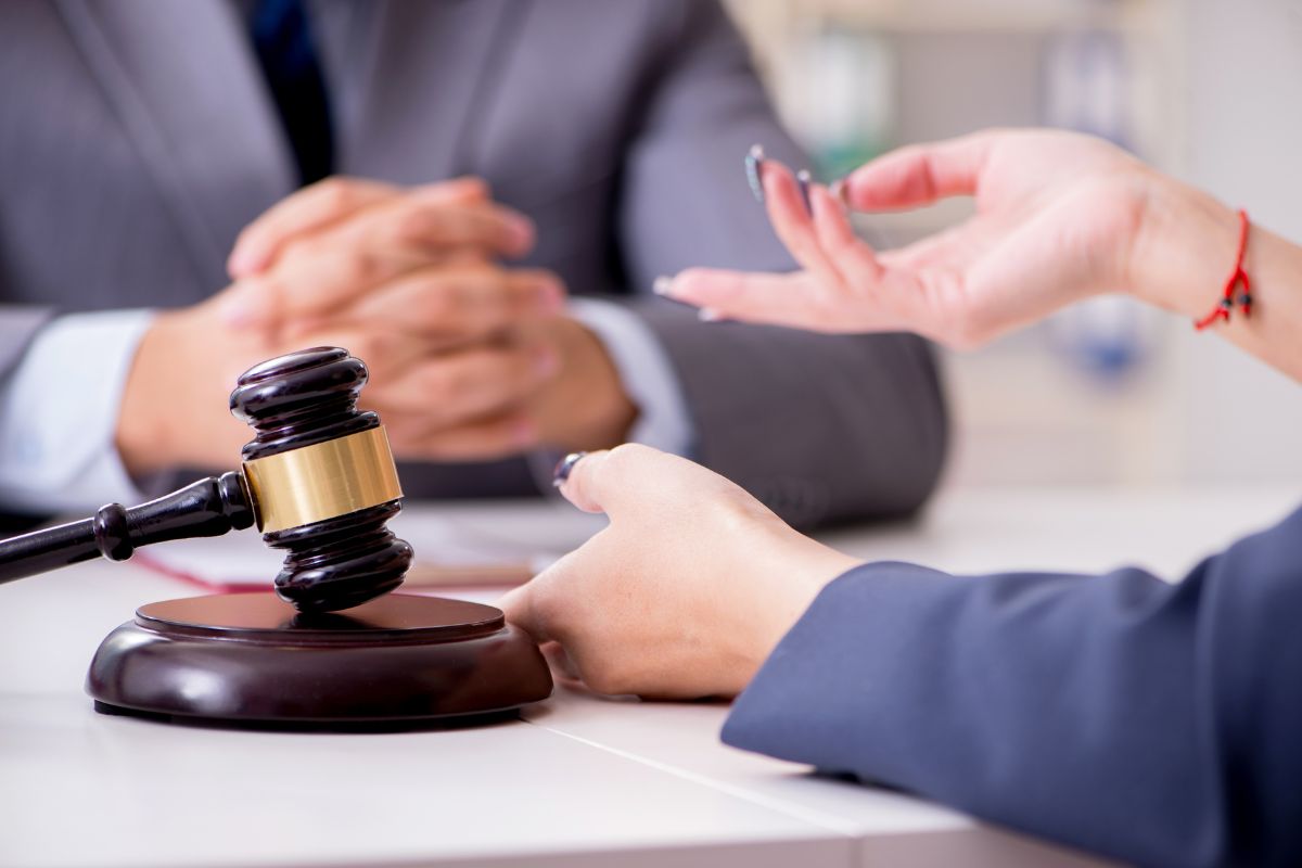 Client consulting with criminal defence lawyer.