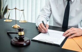 Lawyer reviewing and organizing legal papers.
