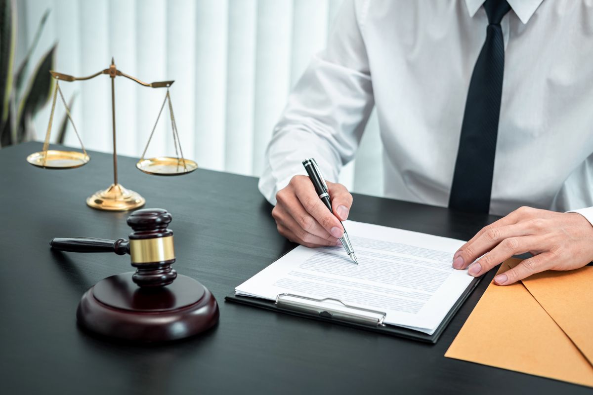 Lawyer reviewing and organizing legal papers.