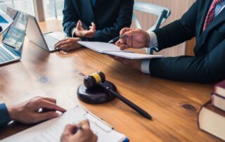 Client reviewing release conditions with a lawyer.