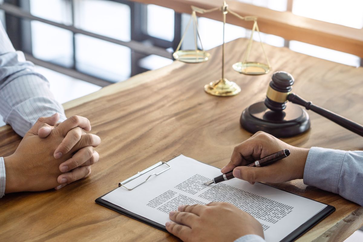 Consultation between a male lawyer and client, giving advice and prosecutions.