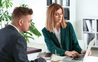 Female lawyer working with innocent client.