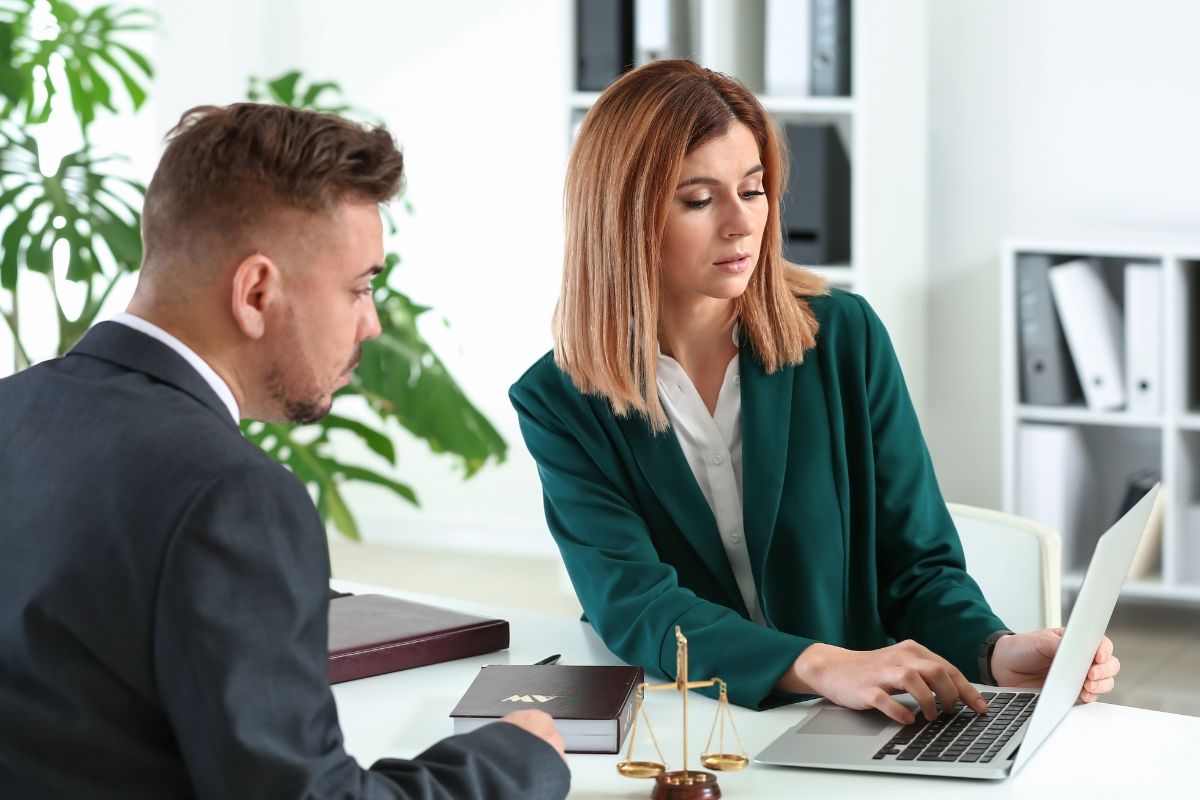 Female lawyer working with innocent client.
