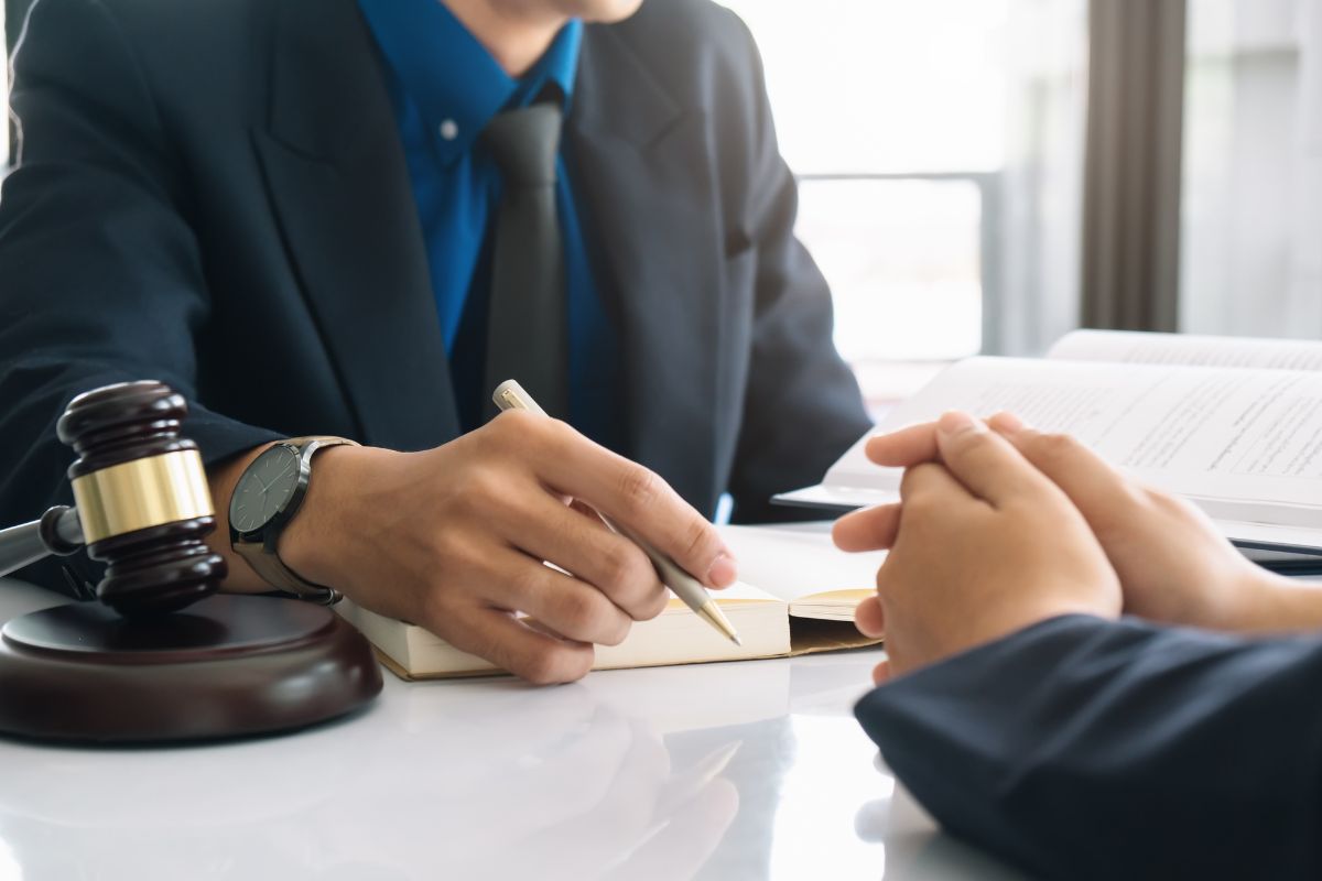 Lawyer discussing probation terms with client.