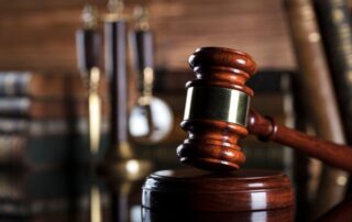 Courtroom gavel symbolizing indictable vs summary offences.