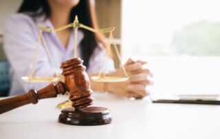 A judge’s gavel and scales of justice.
