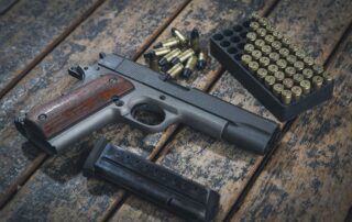 Handgun with wooden grip.