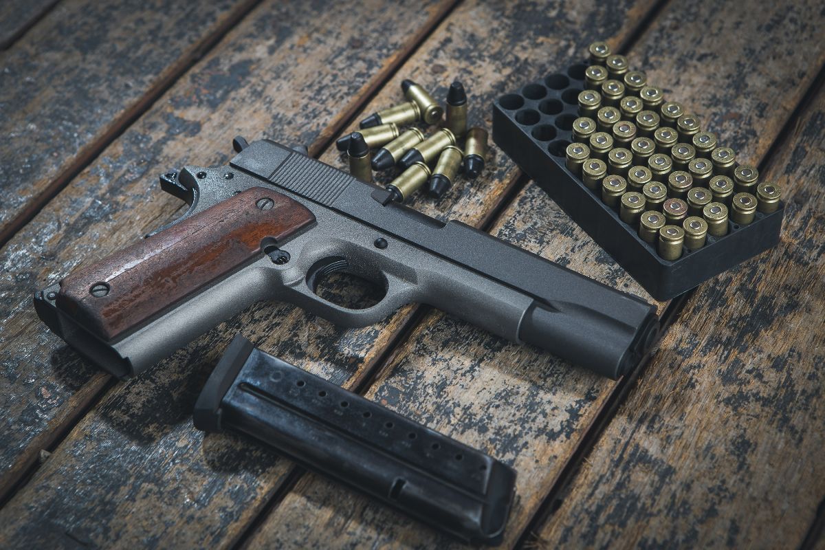 Handgun with wooden grip.