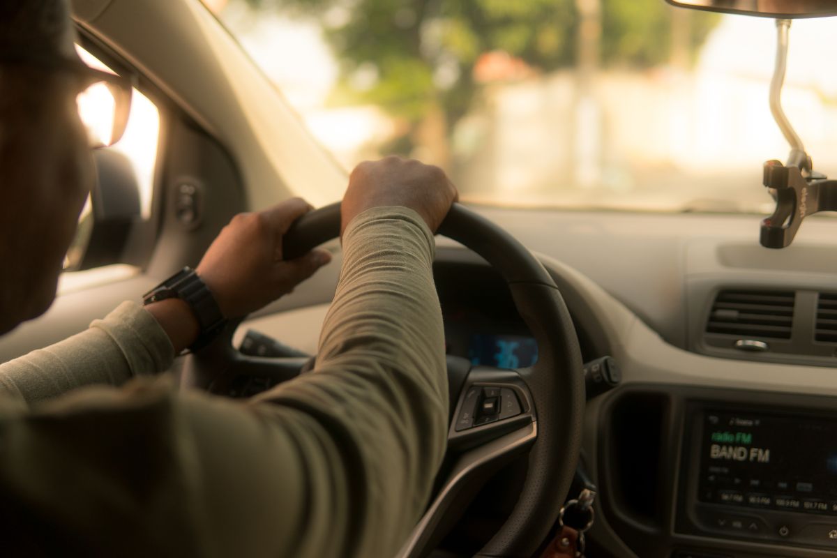 A person driving a vehicle.