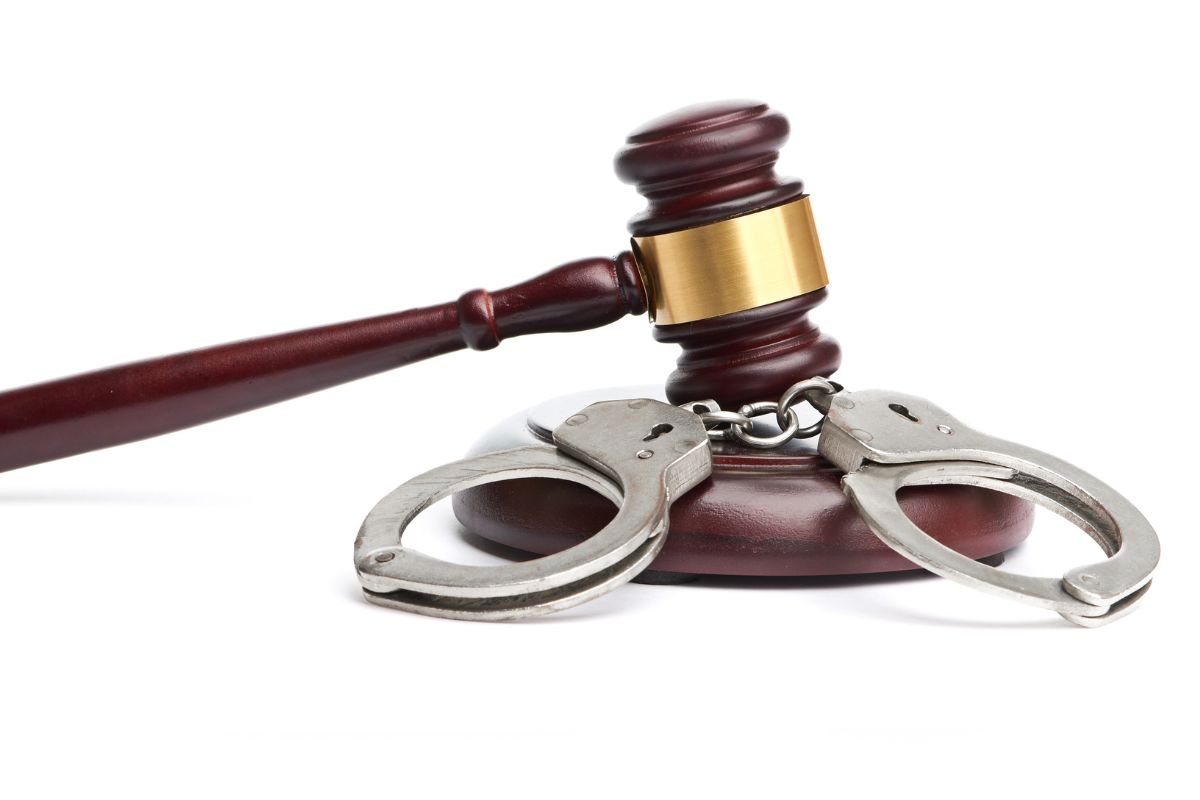 Gavel and handcuffs.