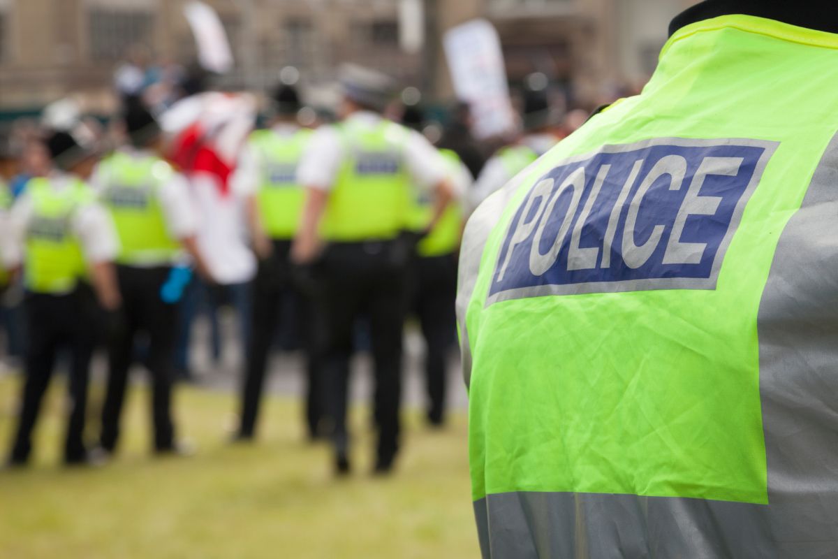 Police officer from behind.