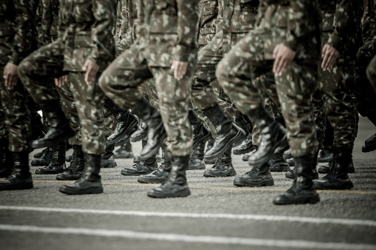 Close-up of soldiers marching in formation.