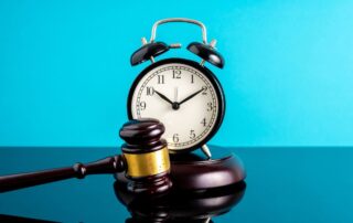 Gavel and alarm clock.