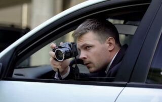 A man is secretly taking photos.