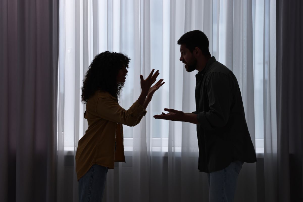A man and woman arguing.