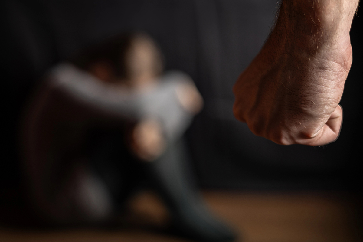 A man with a clenched fist.