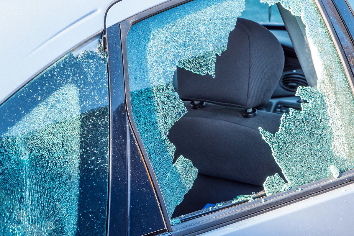 A broken side window of a car