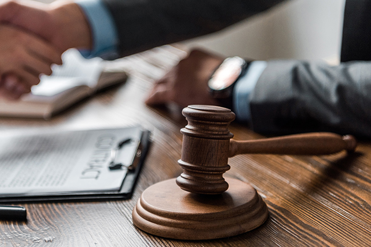 A gavel on a lawyer desk