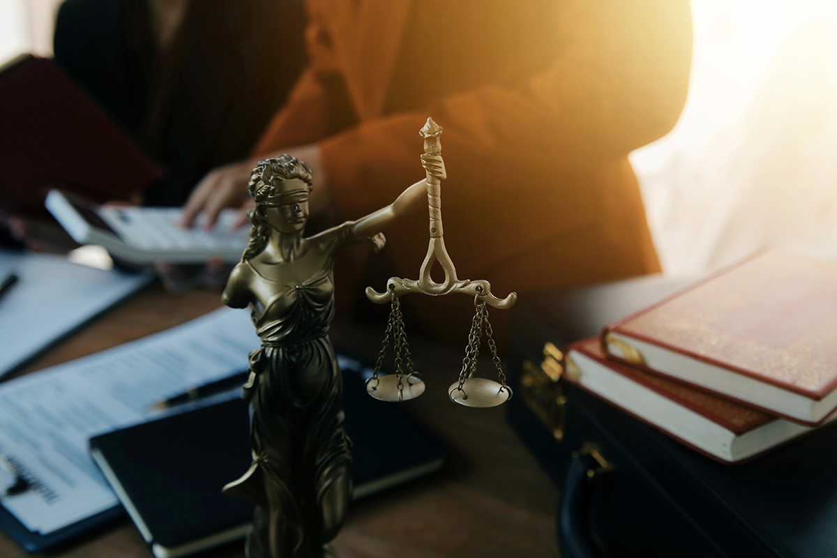 Lady justice on a lawyer's desk