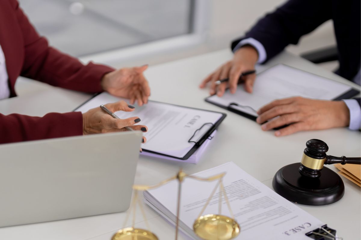 Lawyer reviewing legal documents during an appeal meeting