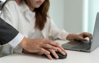 A manager harassed a female colleague.