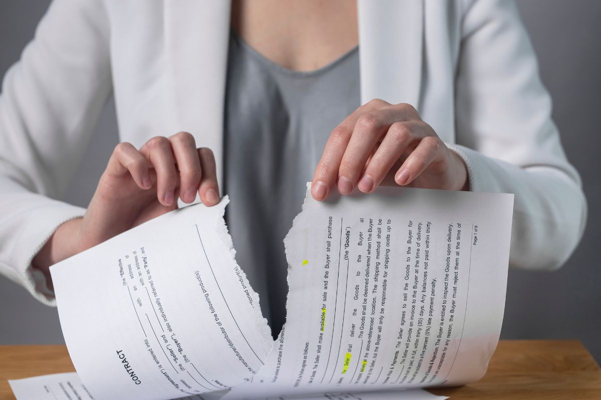 Ripping paper document and breaching rules. Ripping paper document and breaching rules.