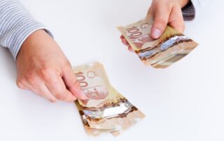 A businessman accepting a bribe.
