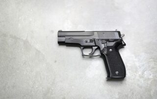 Black handgun.