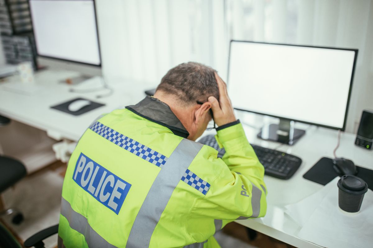 A police officer submits a false report. A police officer submits a false report.