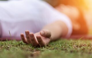 A dead person lying on the ground.