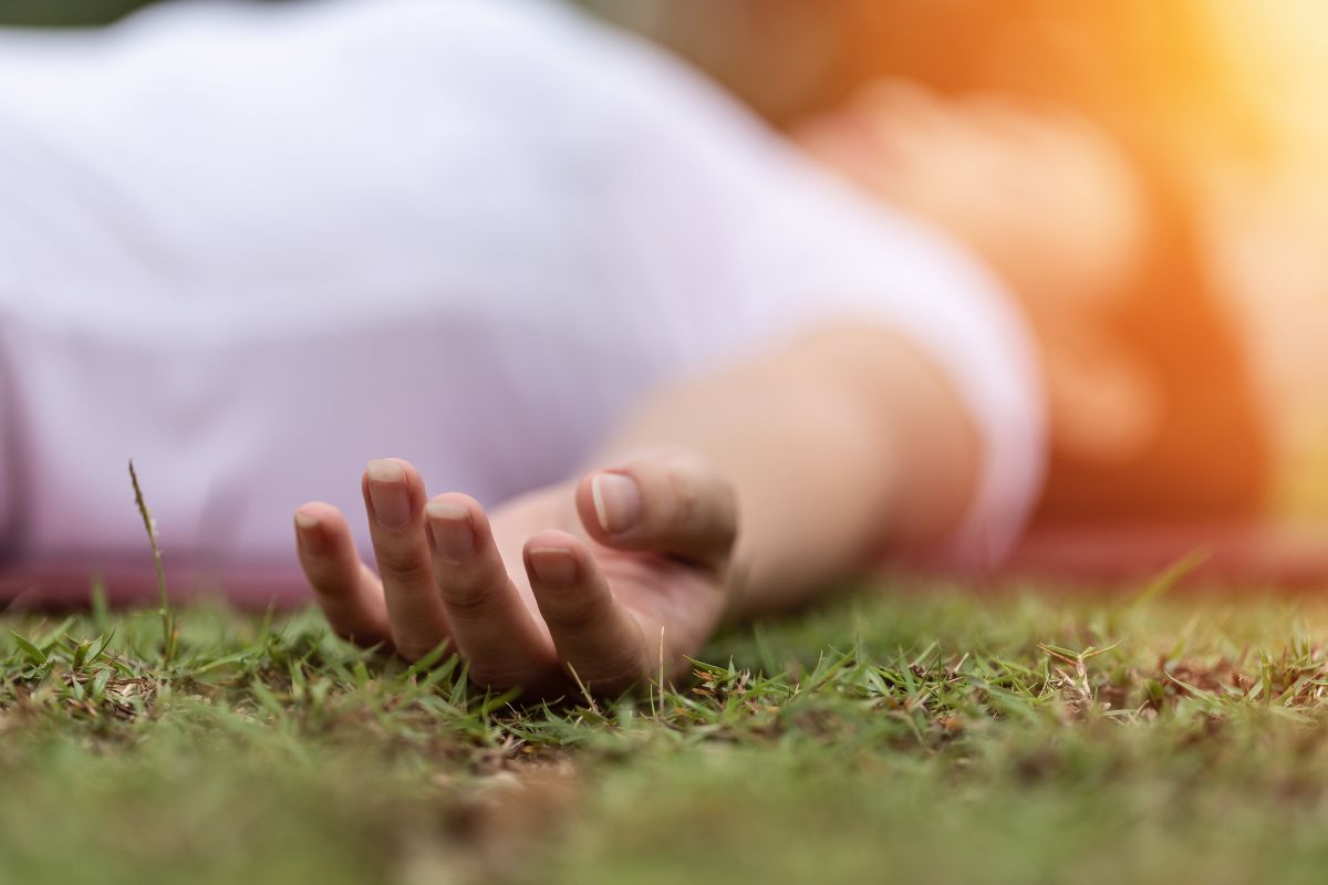A dead person lying on the ground. A dead person lying on the ground.
