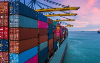 Cargo ship loaded with shipping containers.