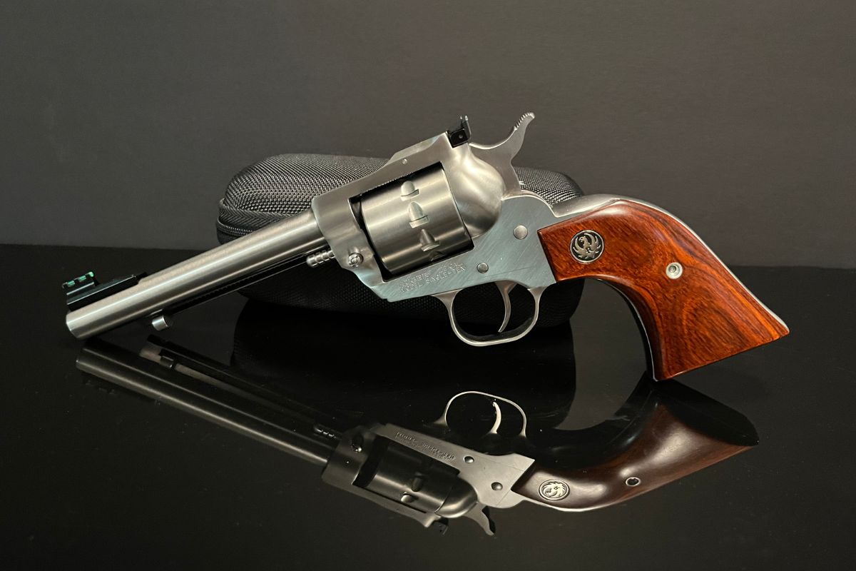 A handgun with a wooden grip. A handgun with a wooden grip.